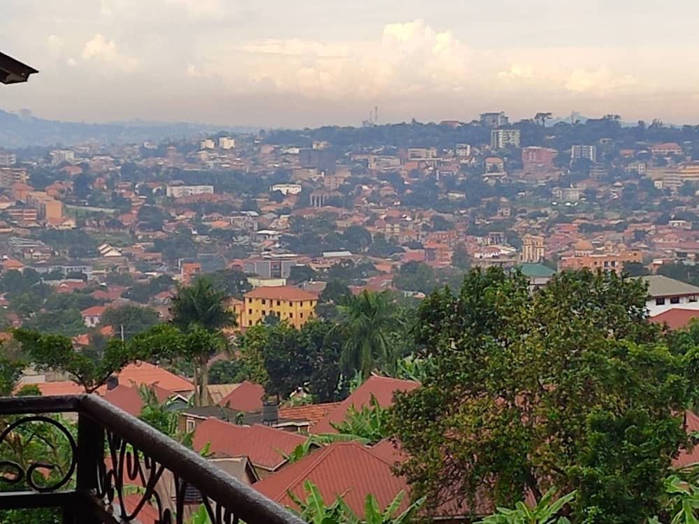 Makindye neighborhood Kampala showing residential area with mature trees and compounds